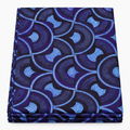 Cobalt Scale Arc Ankara wax print fabric, folded
