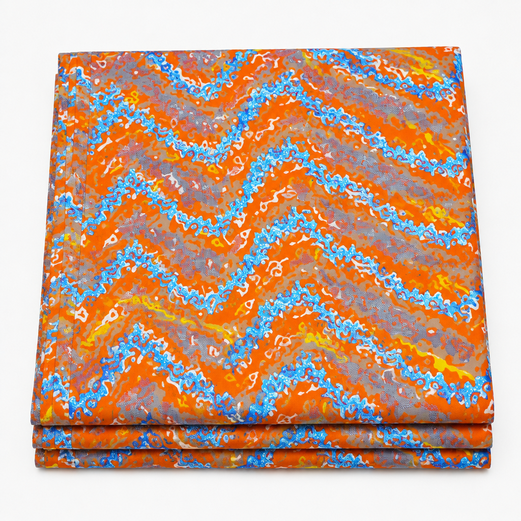 Sunset Ember Chevron Ankara wax print fabric, folded